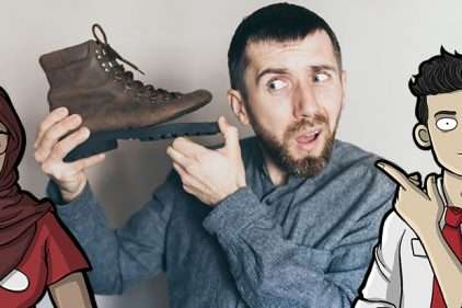 Retail workers looking shocked at a pair of damaged shoes