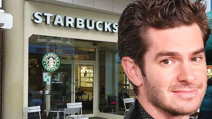 Andrew Garfield working at Starbucks